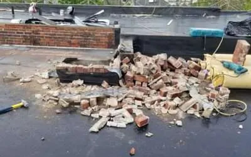 Loose Brick, Broken Chimney on Rooftop