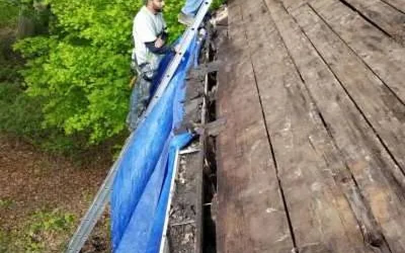 Waze Crew Repair Work on Roof