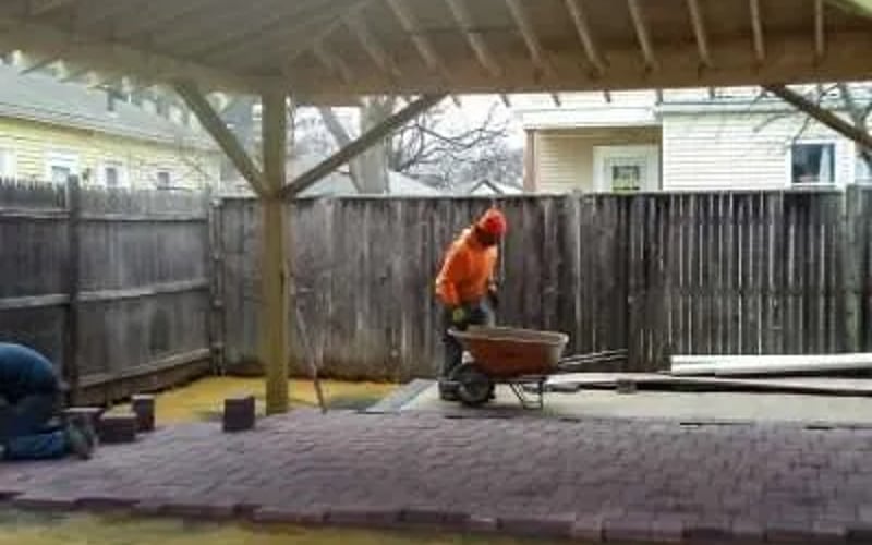 Waze crew building a stone patio